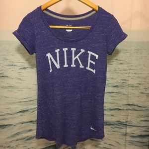 Nike shortsleeved T-shirt purple Nike logo.